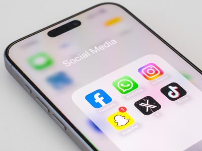 A close up of an iPhone on a white surface